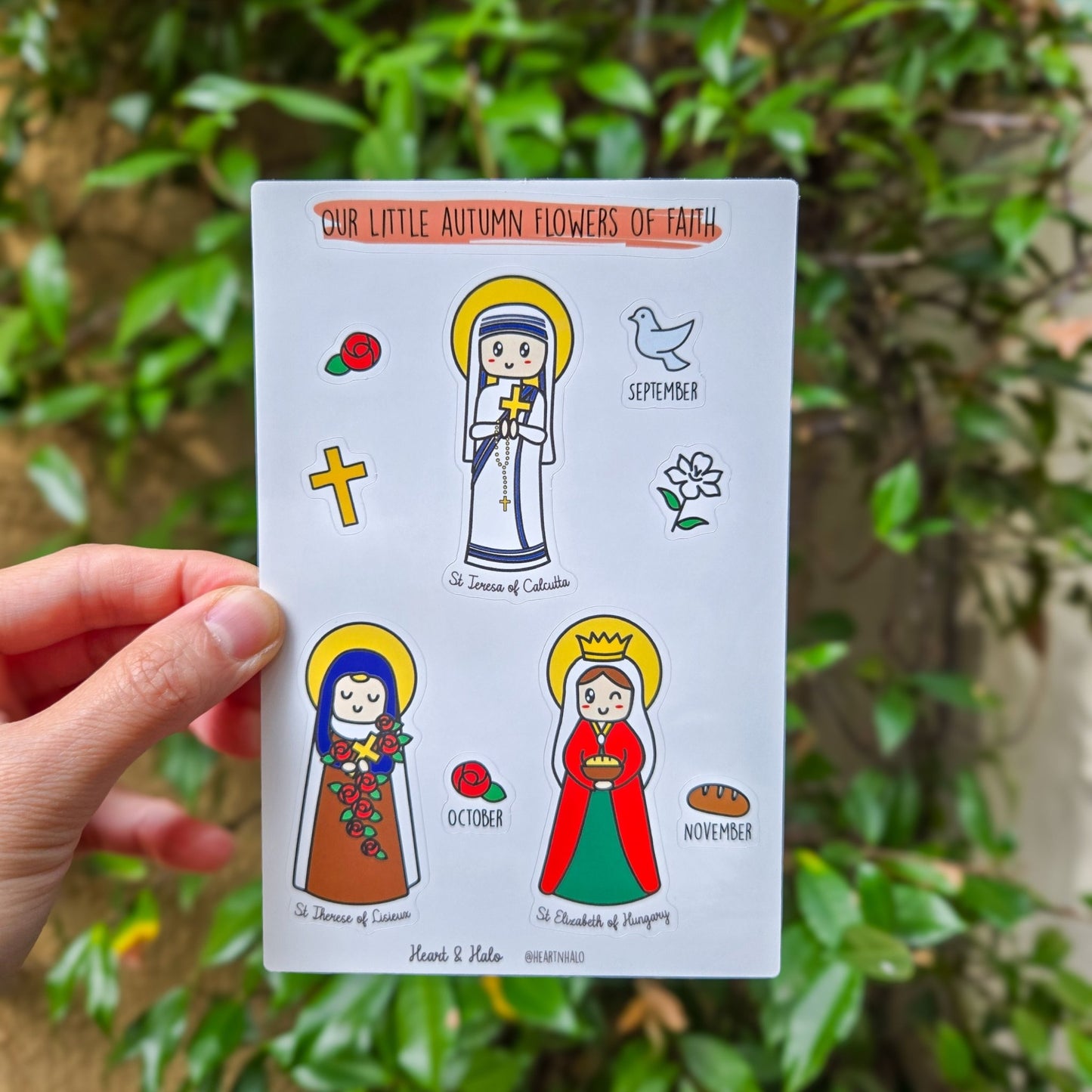 Our Little Autumn Flowers of Faith 4" x 6" Sticker sheet, St. Teresa of Calcutta, St. Therese of Lisieux, and St. Elizabeth of Hungary, Catholic Saints - Heart & Halo